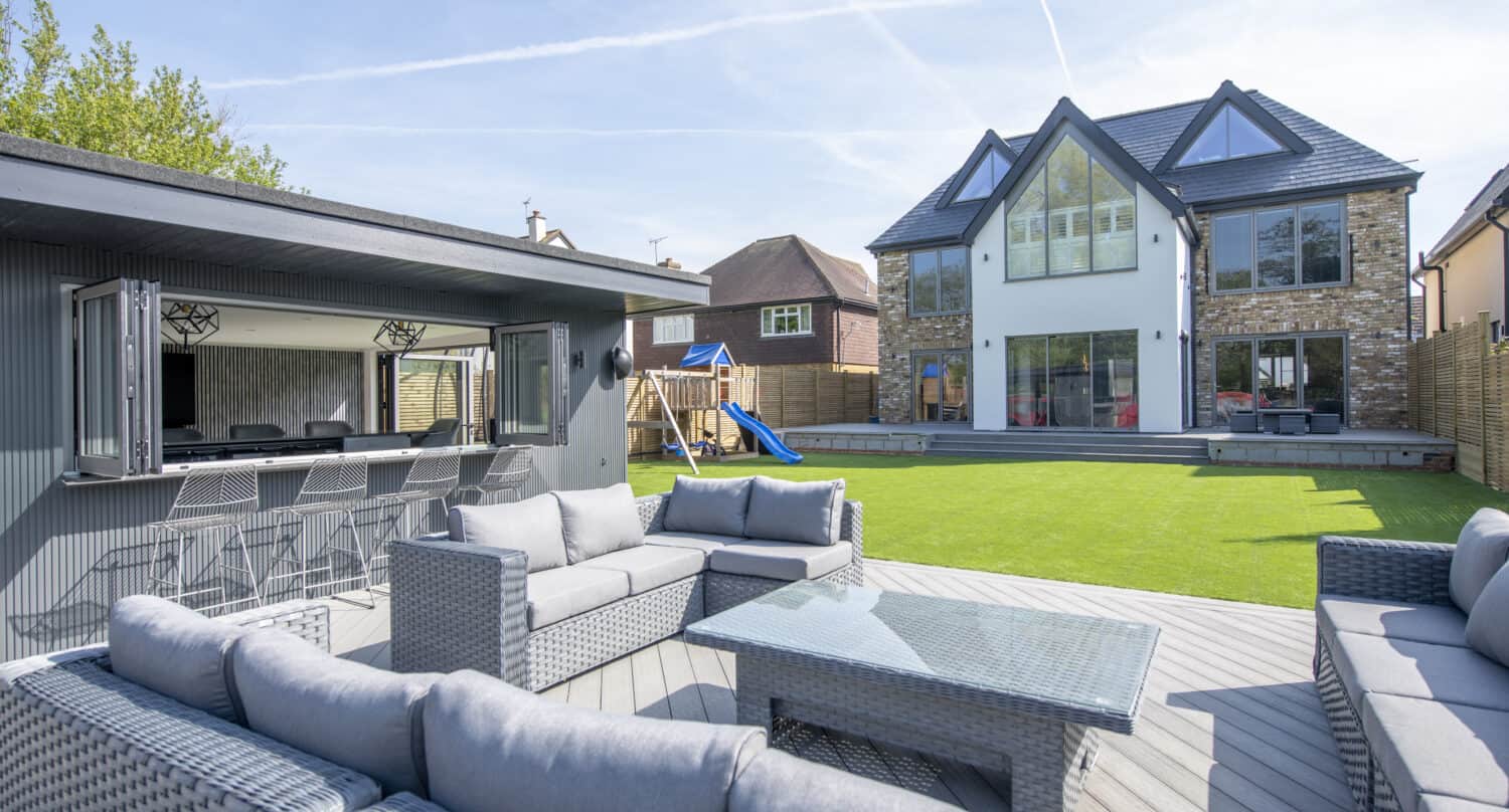 Stunning garden social space complete with bar and bifold casement windows