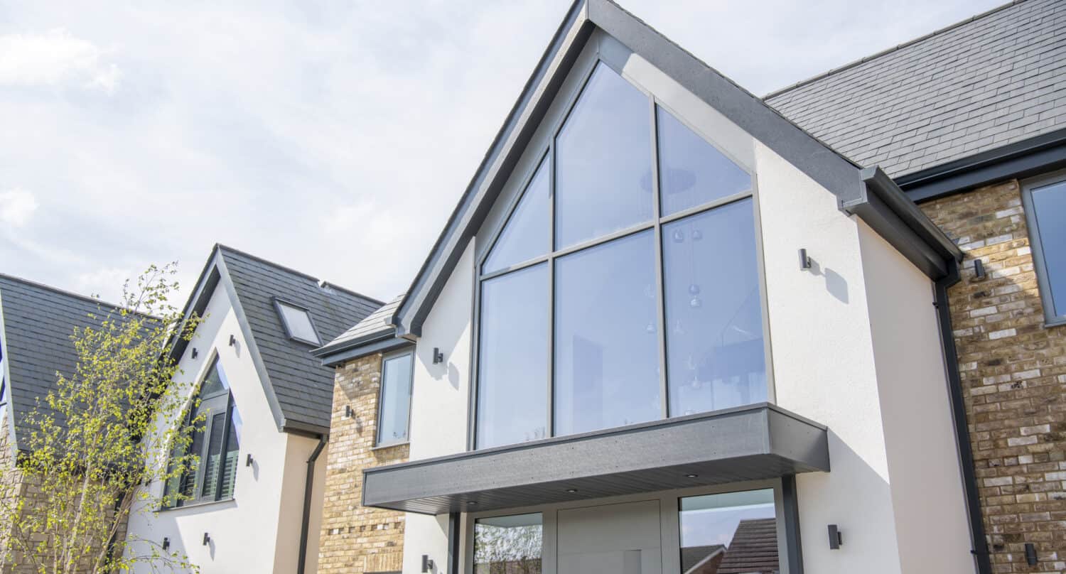 Aluminium glass curtain walling paired with a triangular roof design