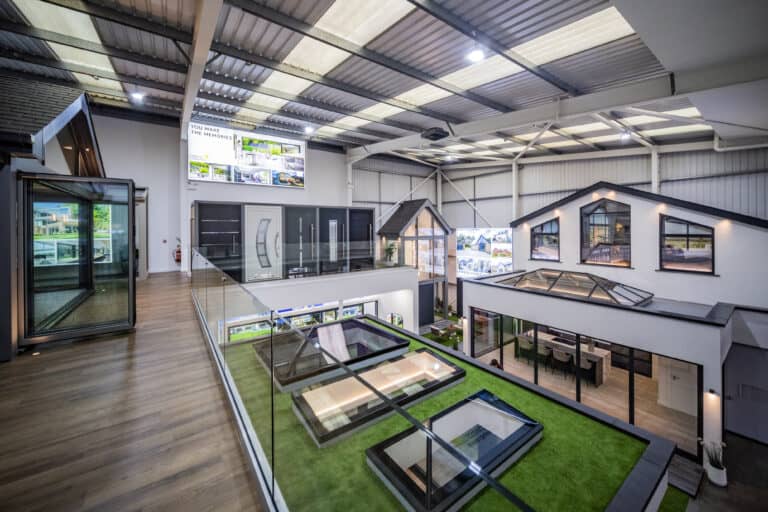Bifold doors, aluminium entrance doors and glass roof systems display in a showroom