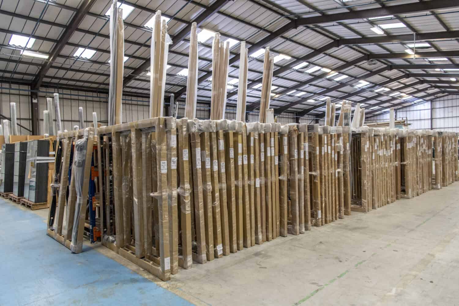 Packed bifold door frames in a warehouse