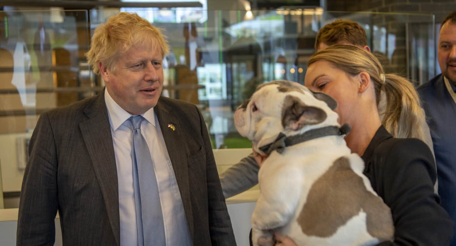 Boris Johnson meeting all Express Bifolds team including a frenchie