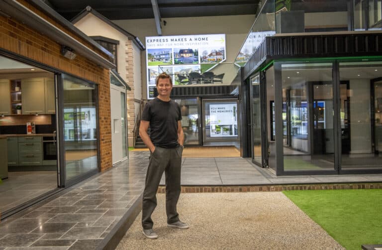 Man standing in Express Bi Folding Doors showroom