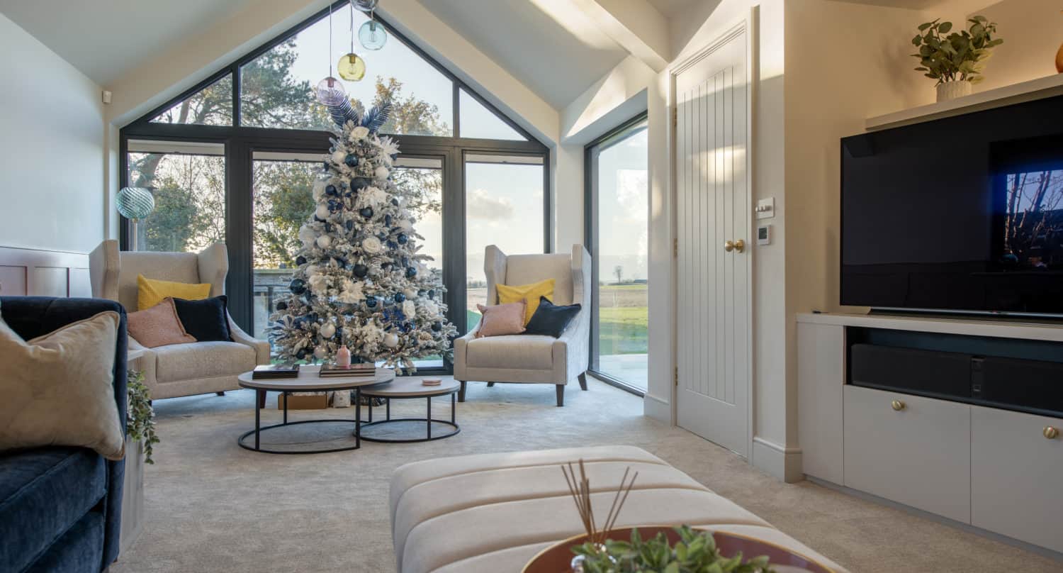 aluminium features in a living room with a christmas tree