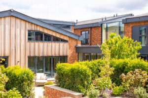 House exterior with aluminium features and wood